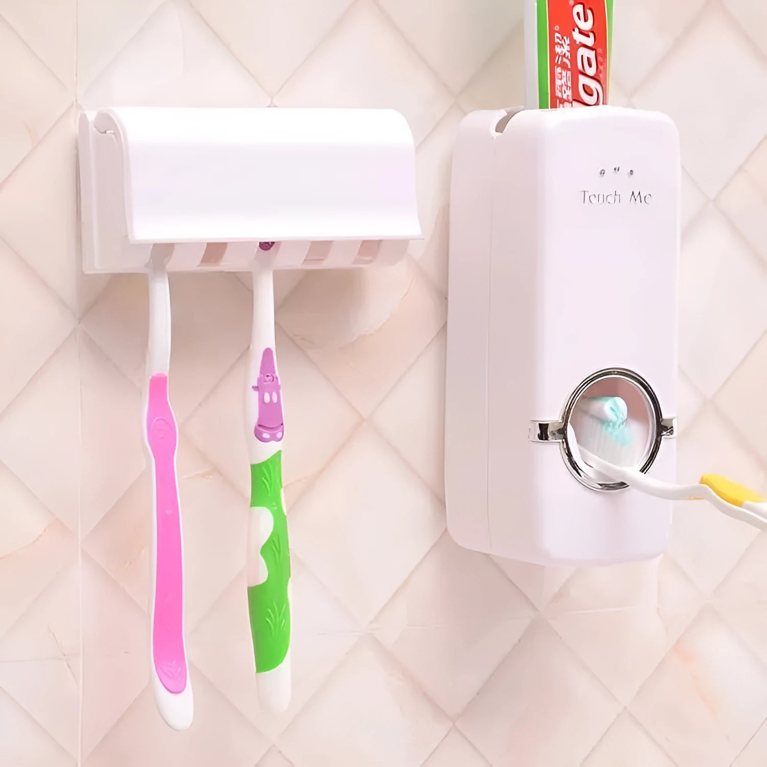 White adhesive plastic toothbrush holder set mounted on a smooth bathroom wall
