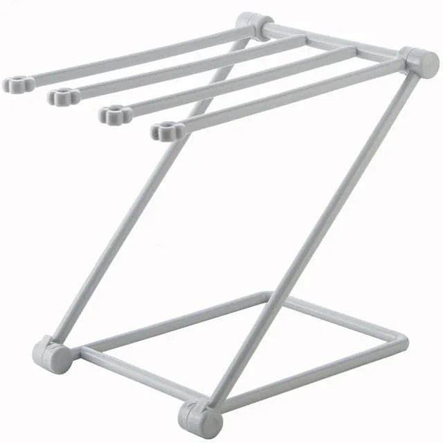 Foldable vertical dishcloth shelf in light blue with punch-free installation for kitchen organisation.