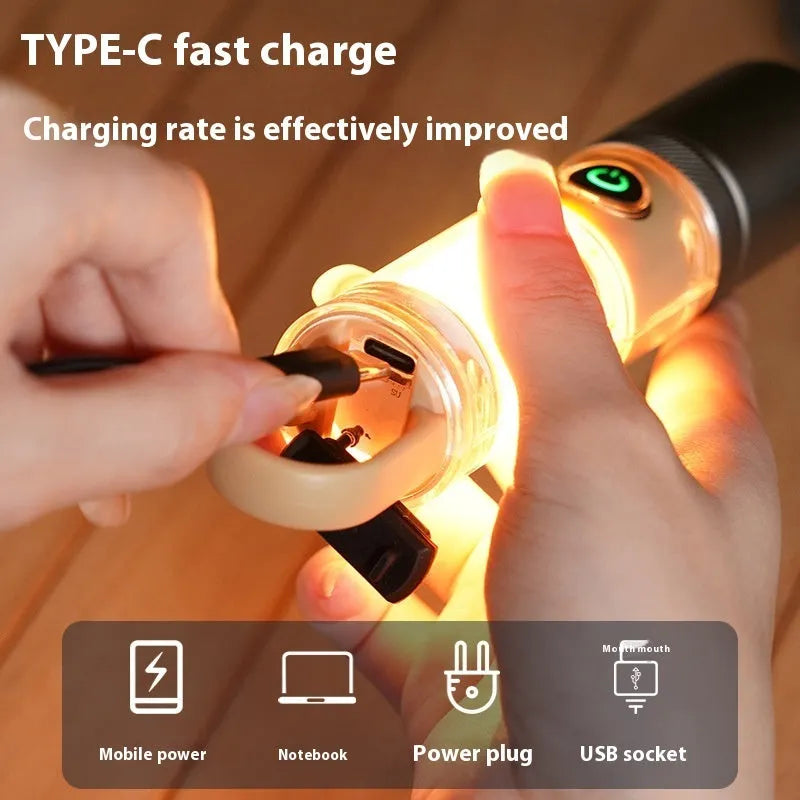 Orange 10W LED torch with optical zoom lens and keychain, shown with USB charging cable.