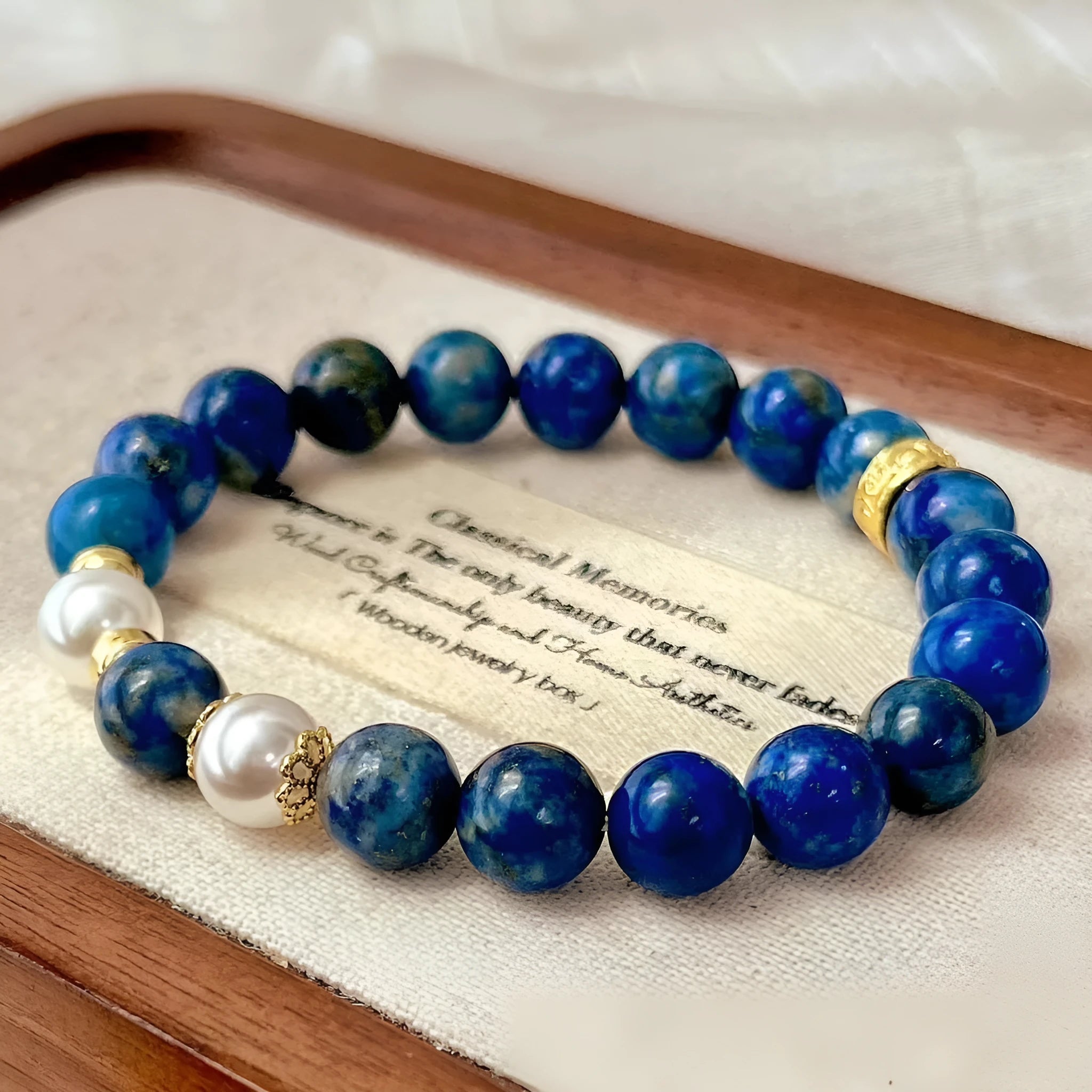 A green and gold lapis lazuli bracelet with a Chinese artistic retro design.