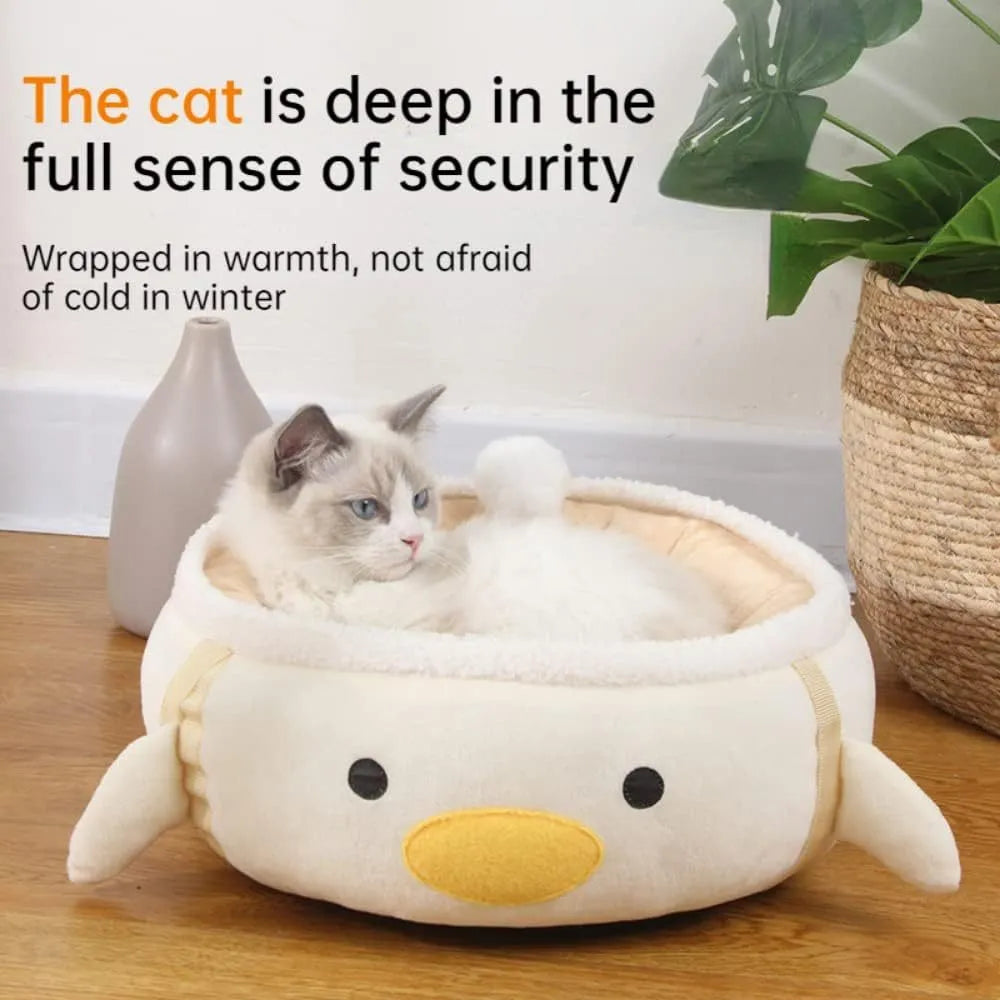Green dinosaur and chick shaped cat bed shown both flat and hanging as a hammock.