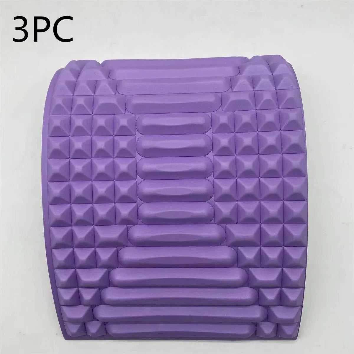 Blue back stretcher pillow for lumbar and neck support on a grey background.