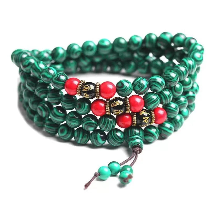 Turquoise Tibetan bracelet with 108 polished beads in synthetic stone
