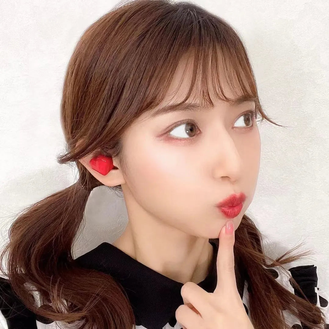 Heart-shaped wireless Bluetooth headphones in Chinese red colour with charging cable