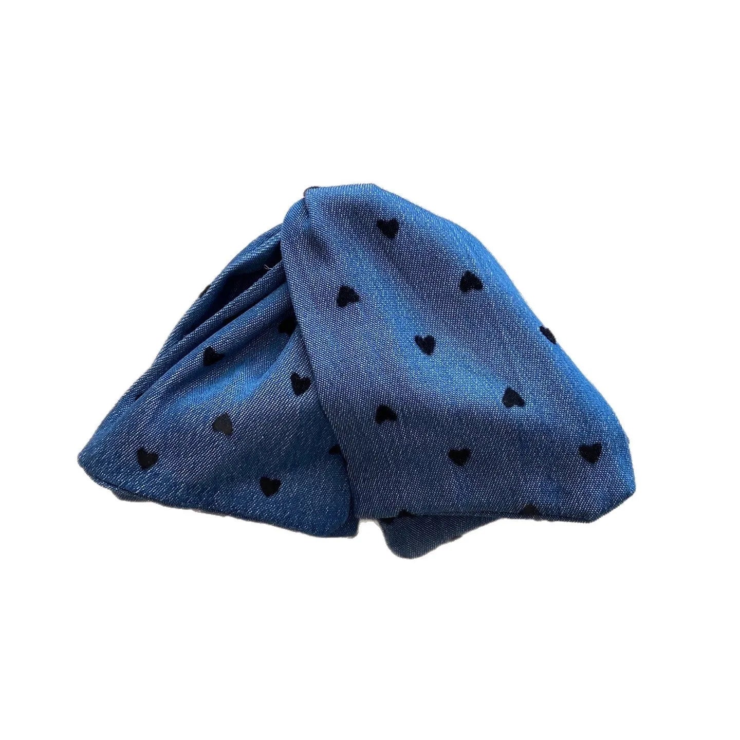 Women's denim bow hair clip with triangle grip, handmade from fabric and acrylic.