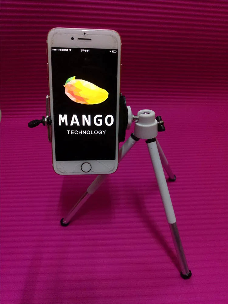Black adjustable desktop phone holder with two-section metal bracket on a wooden desk