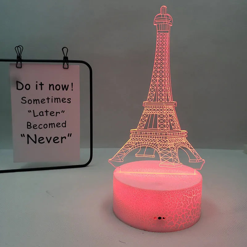 Eiffel Tower shaped 3D acrylic table lamp displaying seven colours, with touch controls and remote.