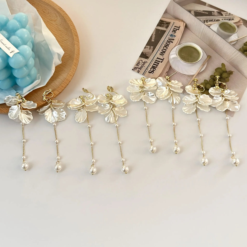 Women's casual acrylic shell pearl tassel drop earrings with choice of four clip types, 8.8cm long.