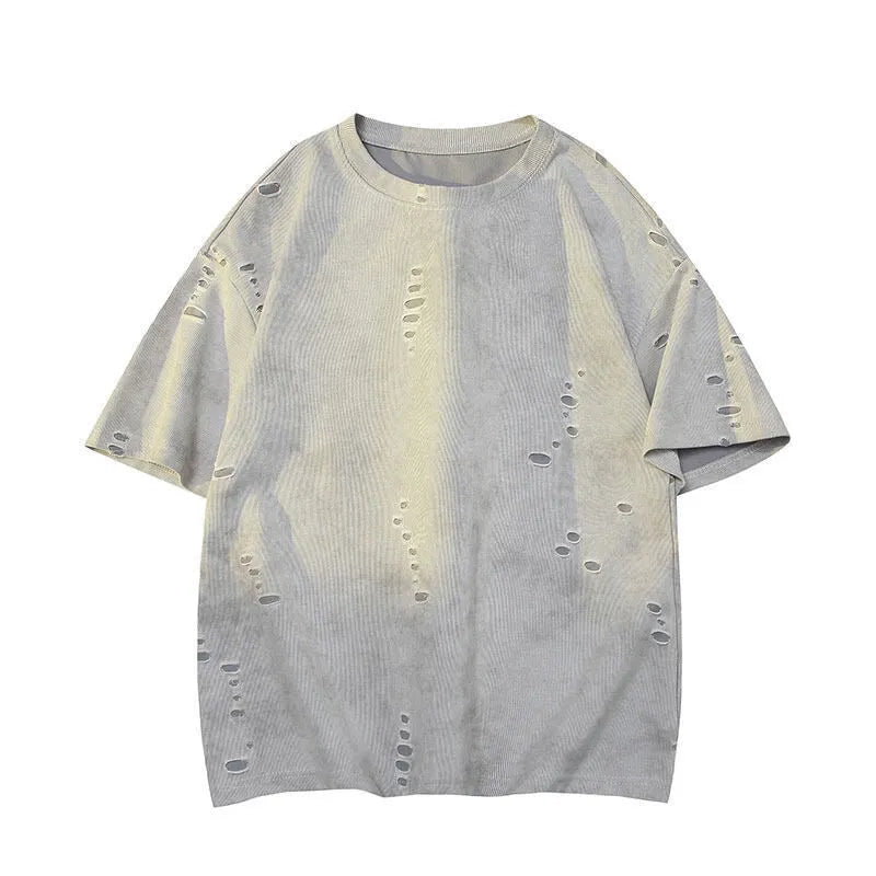 Men's blue cotton blend ripped short sleeve t-shirt showing relaxed fit and distressed detailing