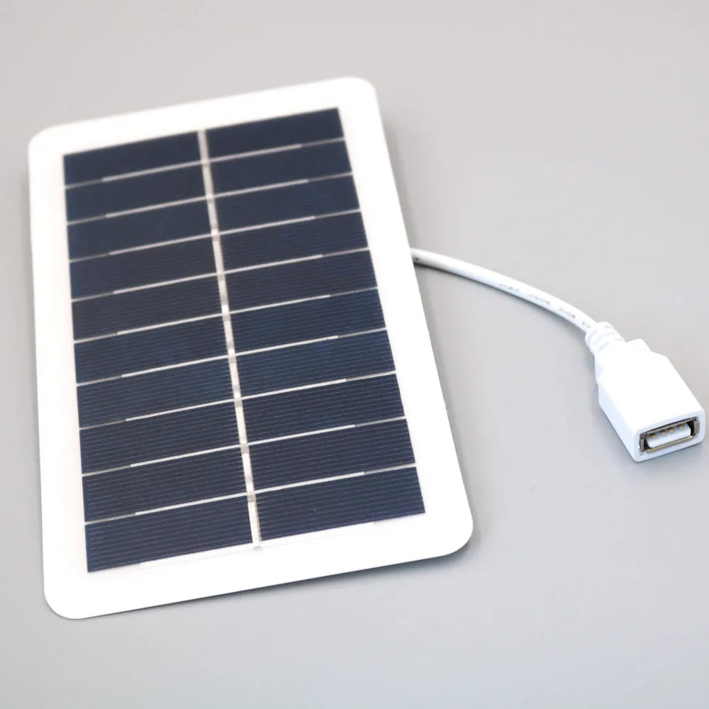 Black solar panel mobile phone charger with USB port and textured PET surface