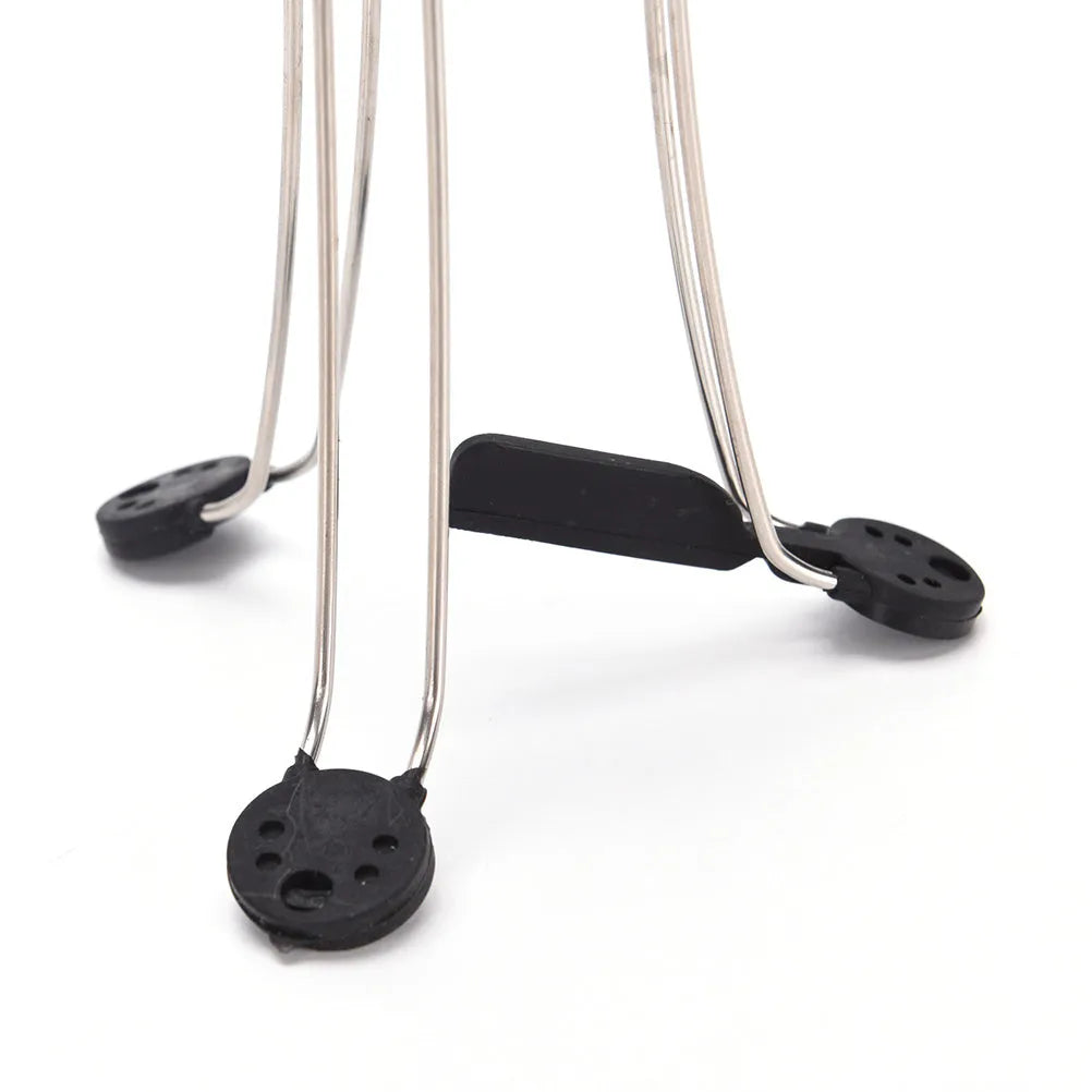 White and black automatic stirrer blender on a kitchen counter