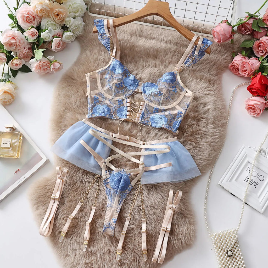 Light blue lace women's bra and knicker set with transparent mesh panels