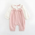 Pink cotton baby girls romper suit with embroidery, long sleeves, and single-breasted closure