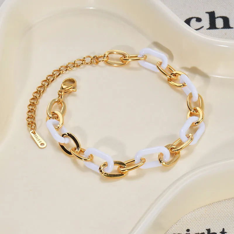 Women's silver stainless steel bracelet with a double-layer red heart charm and magnetic clasp.