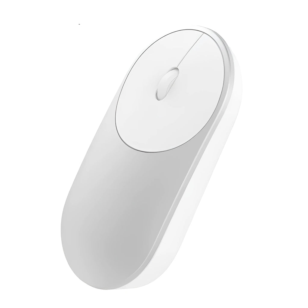 Black wireless Bluetooth mouse beside laptop showing compact design