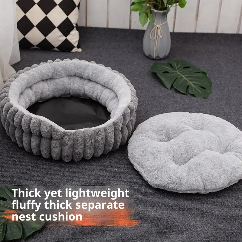 Round plush cat bed in grey, 50cm diameter, on a wooden floor
