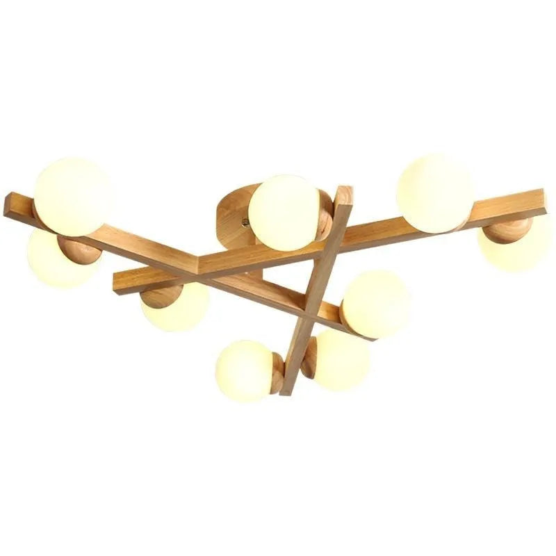 Modern three-headed pendant ceiling light with neutral bulbs in a Nordic style, suitable for a wooden living room.