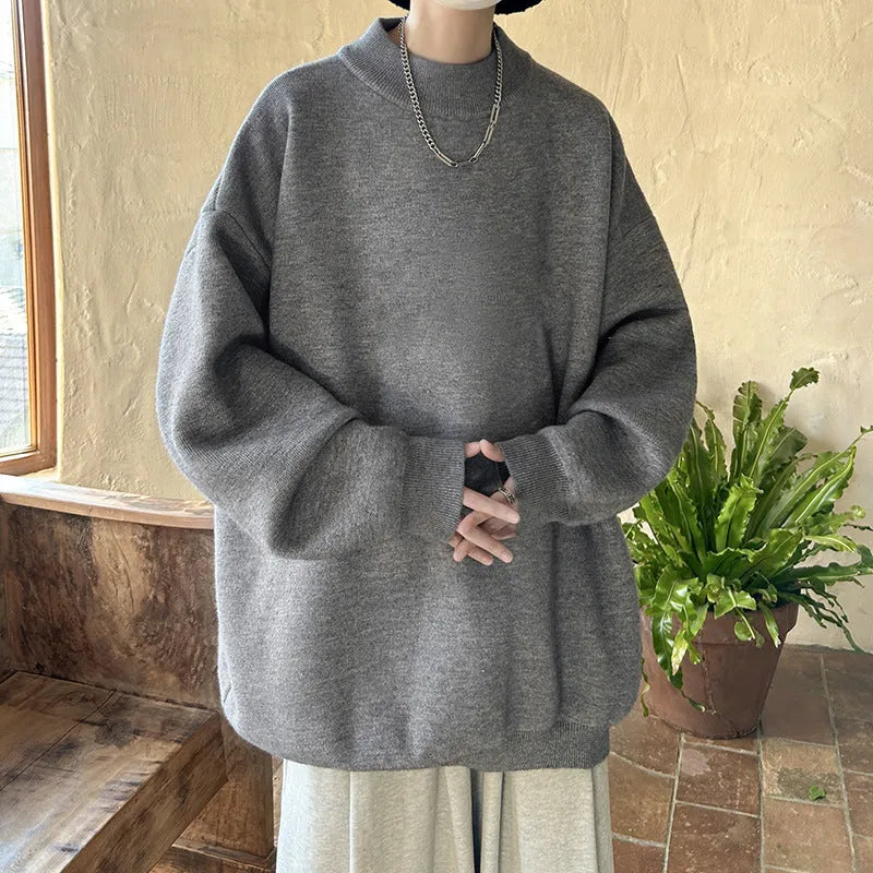 Men's loose-fitting round neck pullover sweater in solid colour with long sleeves