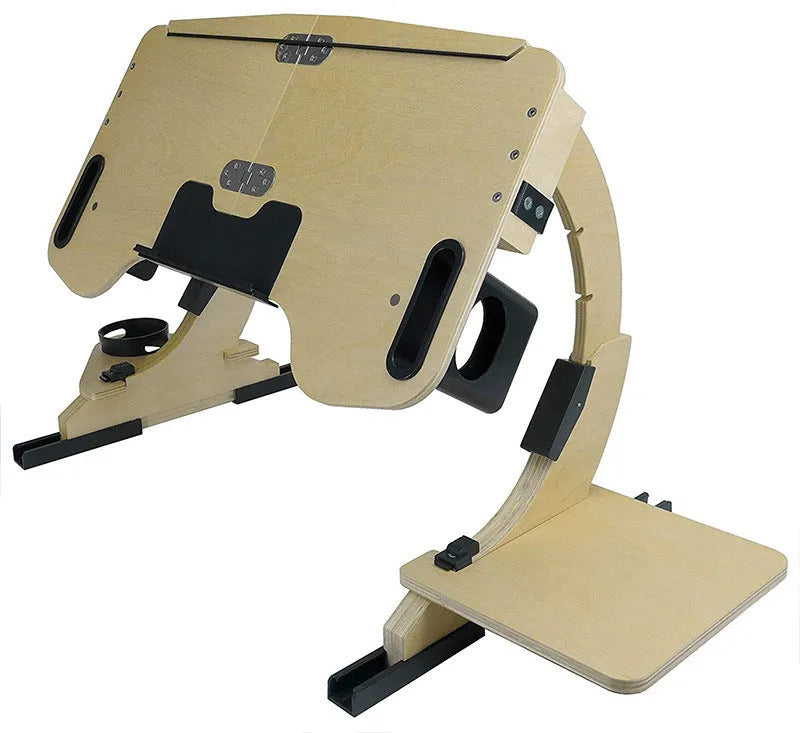 White maple wooden folding bed desk with laptop at an adjustable angle on a duvet.
