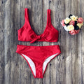 Women's solid colour bikini set in polyester, shown in one of five colour options.
