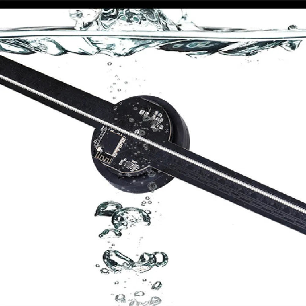 Black 3D holographic advertising fan screen displaying a vibrant floating image, shown with a mobile phone for app control.