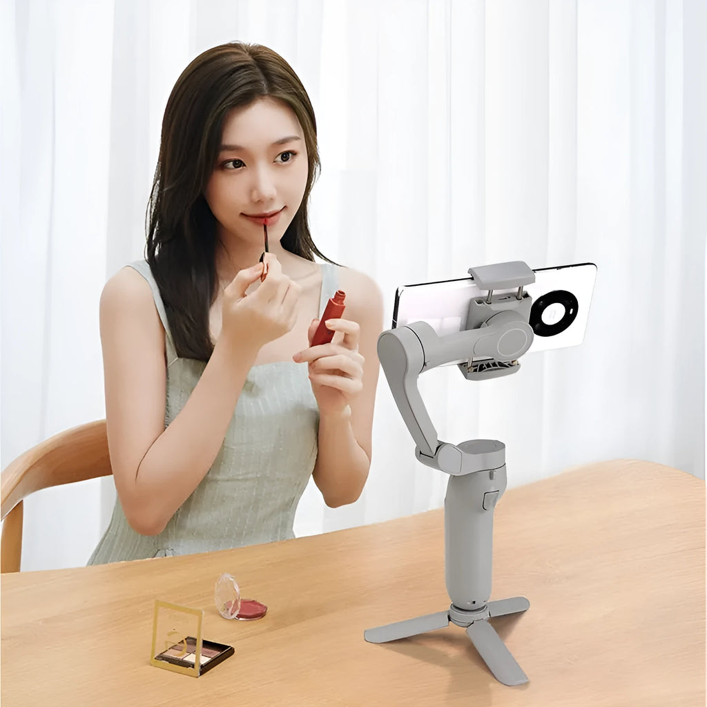 Folding three-axis mobile phone gimbal stabiliser shown in both unfolded and compact folded configurations