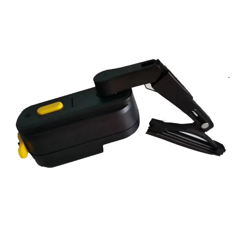 Black 800mA motorcycle helmet wiper motor unit with attached 65mm silicone blade on a helmet.