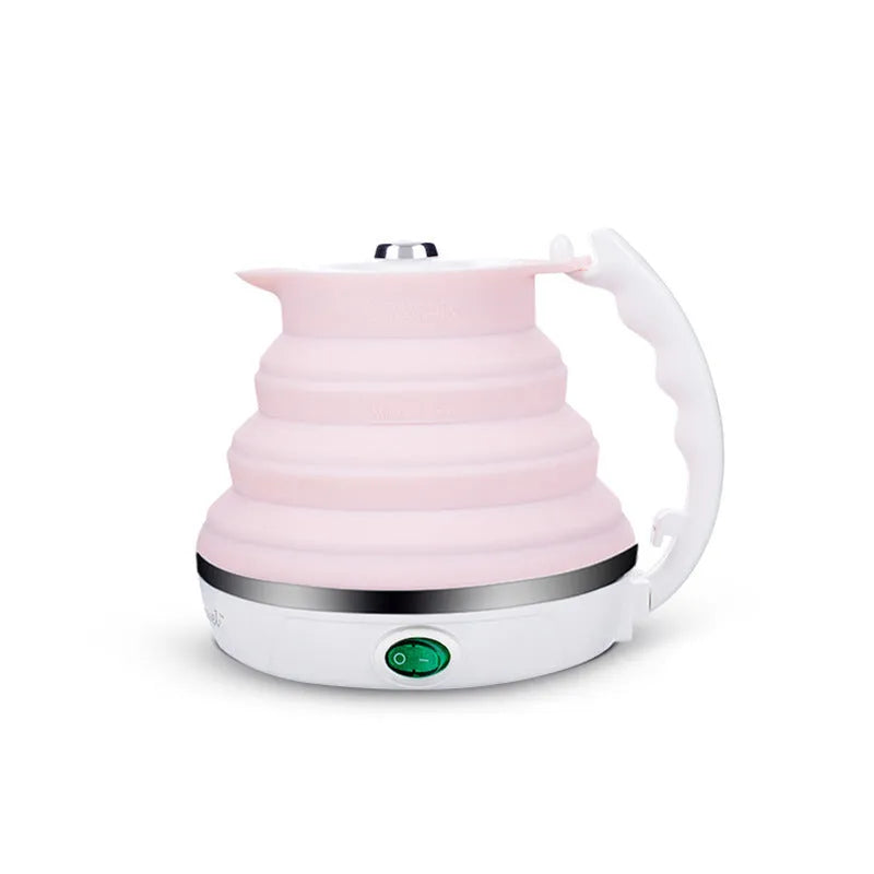 Foldable electric kettle in collapsed position showing compact 50mm height, silicone body, and power cord
