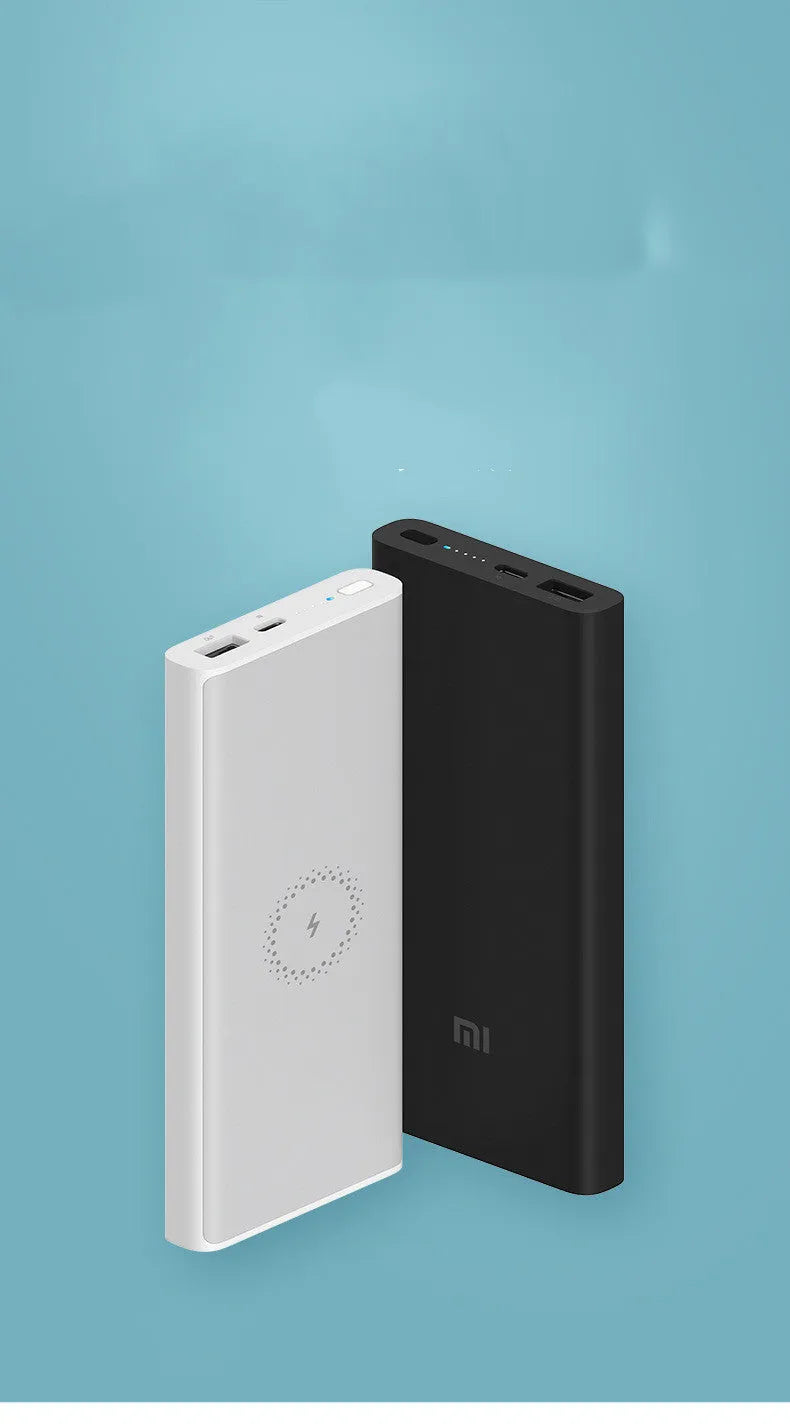 Black and white 10000mAh power bank with fast charging and wireless output features.