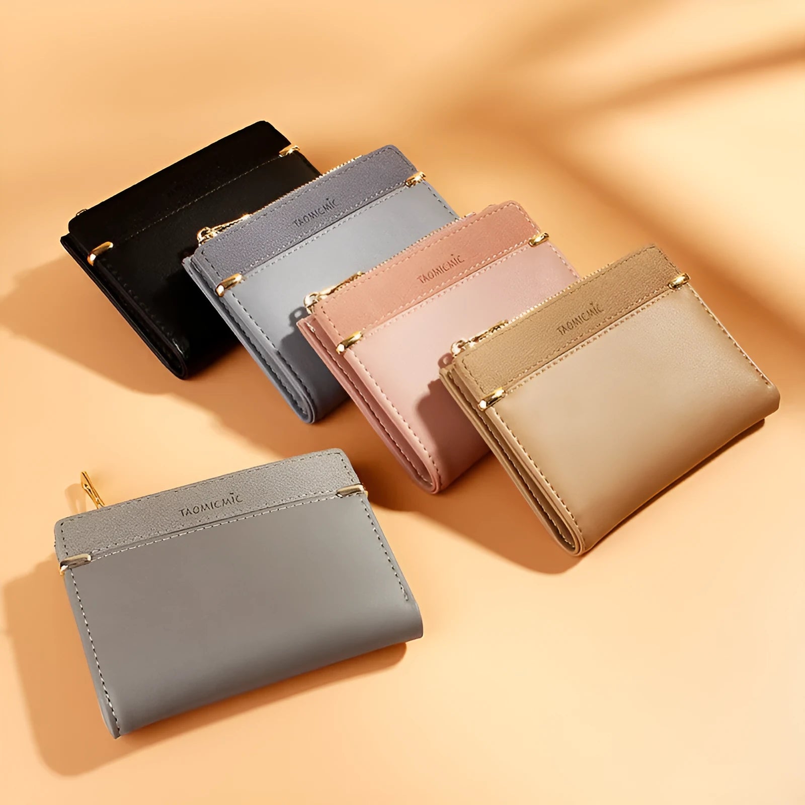 A folded ladies wallet in PU leather with a zipper, showing internal card slots and compartments.