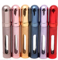 Blue aluminium travel perfume atomiser bullet bottle with glass liner, 12ml capacity.