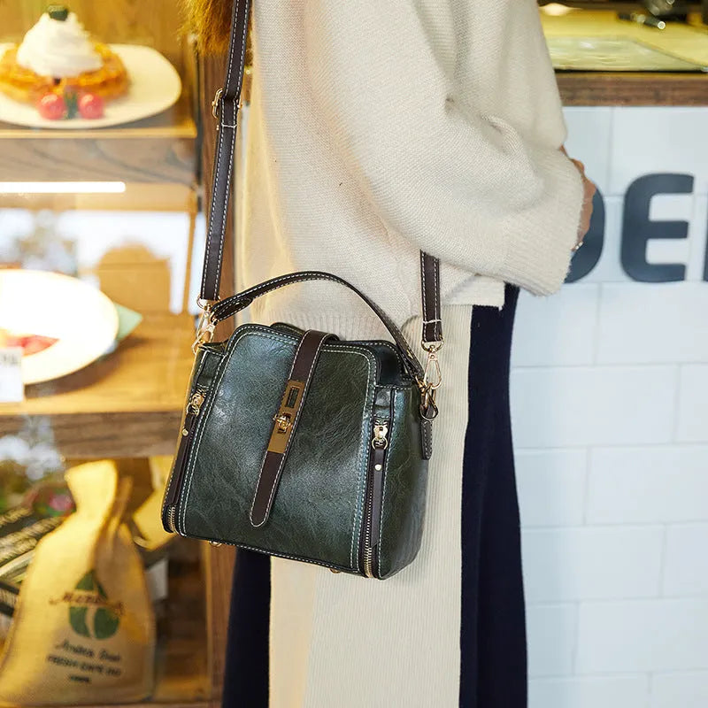 Faux leather women shoulder bag in black with detachable handle and adjustable strap