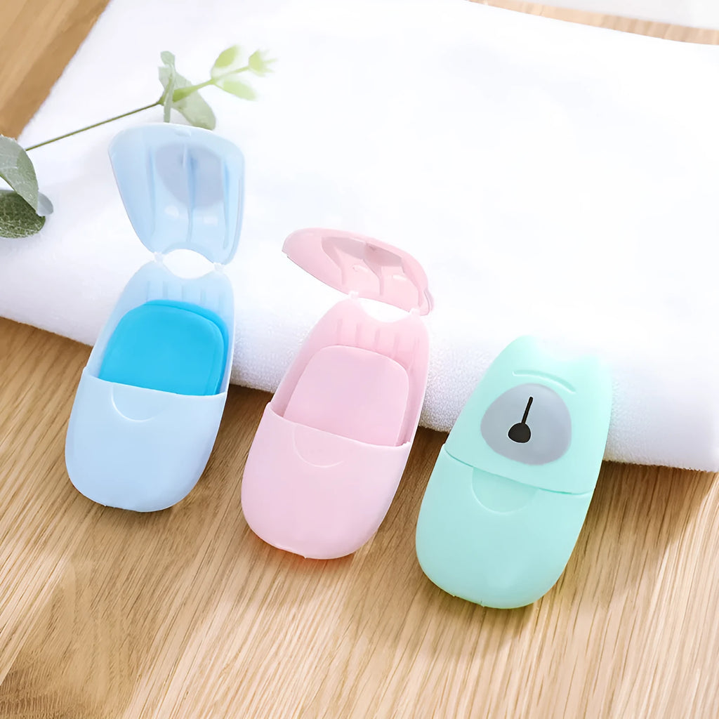 Pack of 50 disposable biodegradable soap paper sheets in pink, blue, and green colours for travel hand cleaning