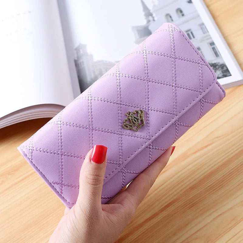 Embroidered crown PU leather tri-fold wallet for women with cross pattern and draw buckle closure
