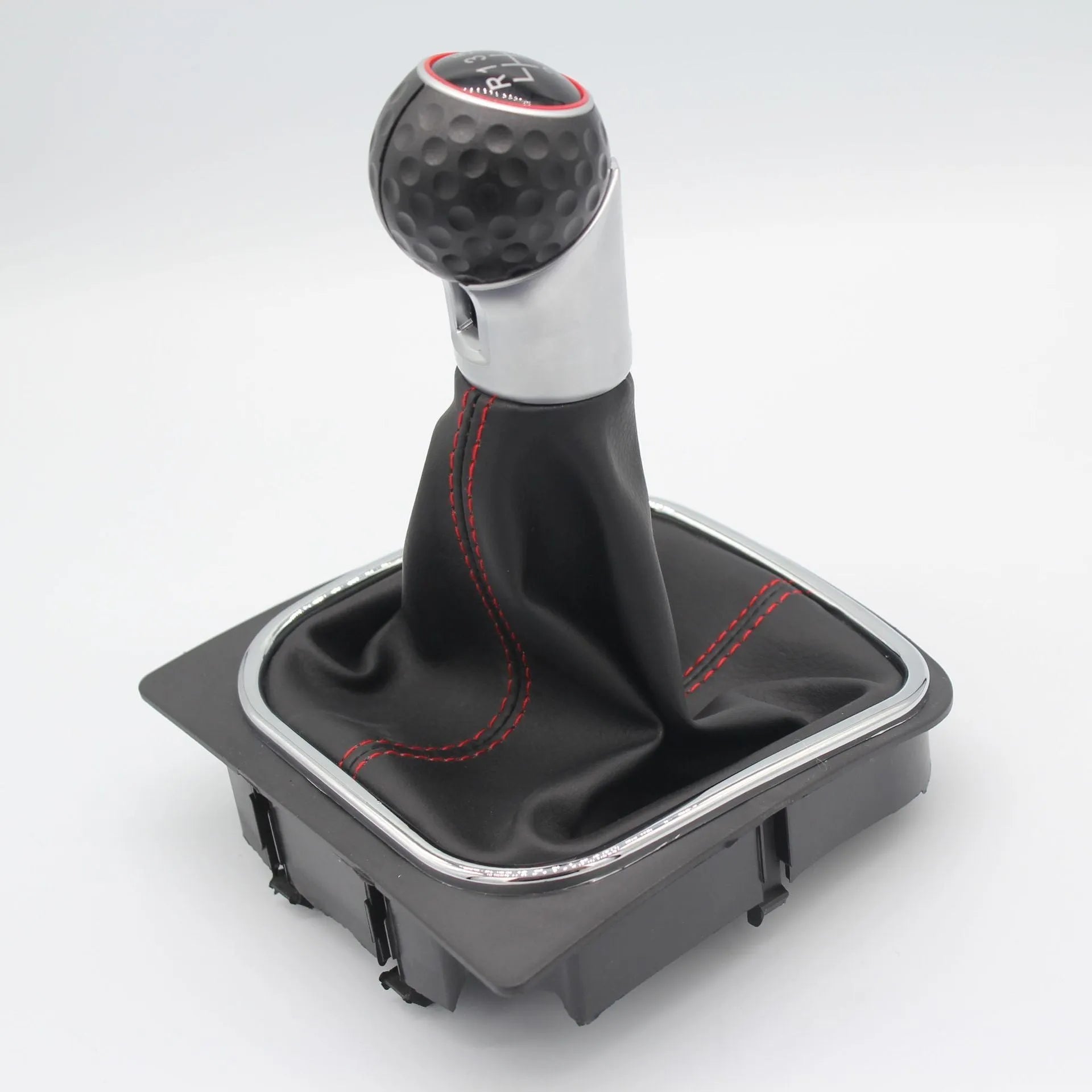Leather gear lever handball with dust boot for Volkswagen Golf models on a car interior.