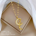 Moon Tassel Necklace with diamond-set copper pendant on a stainless steel chain.