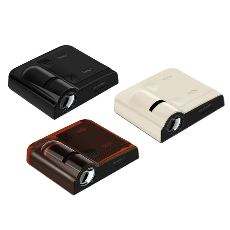 Compact black and beige ABS plastic car decorative projection radium lamp with battery compartment.