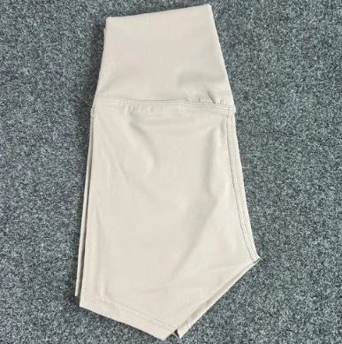 Women's high-waist yoga shorts in nylon fabric, shown in a colour selection including pink litchi and electric blue.