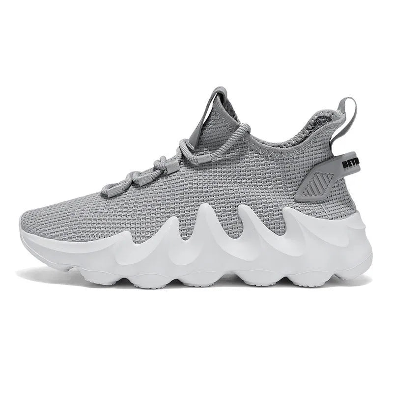 Men's black low-top sock-like sports shoes with a lace-up front and wear-resistant sole on a white background.