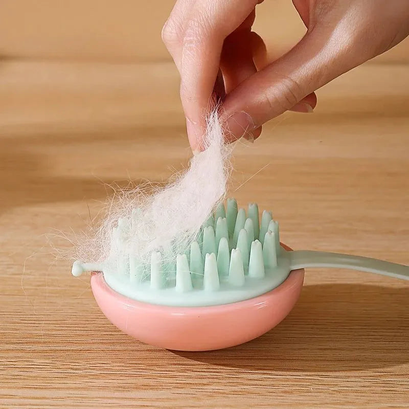 Silicone pet bathing brush with massage nubs for cats and dogs in blue, pink, white, or yellow options