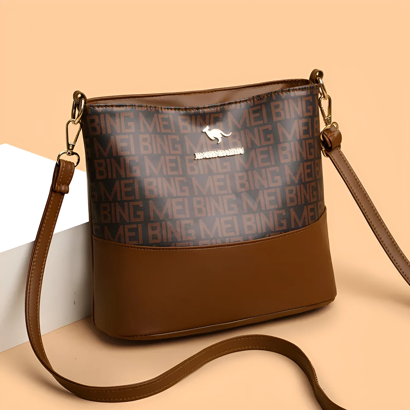Brown soft PU leather messenger bag with external pocket and organised interior compartments.