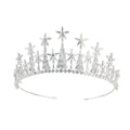 Copper bridal crown with zircon accents in gold finish on a stand