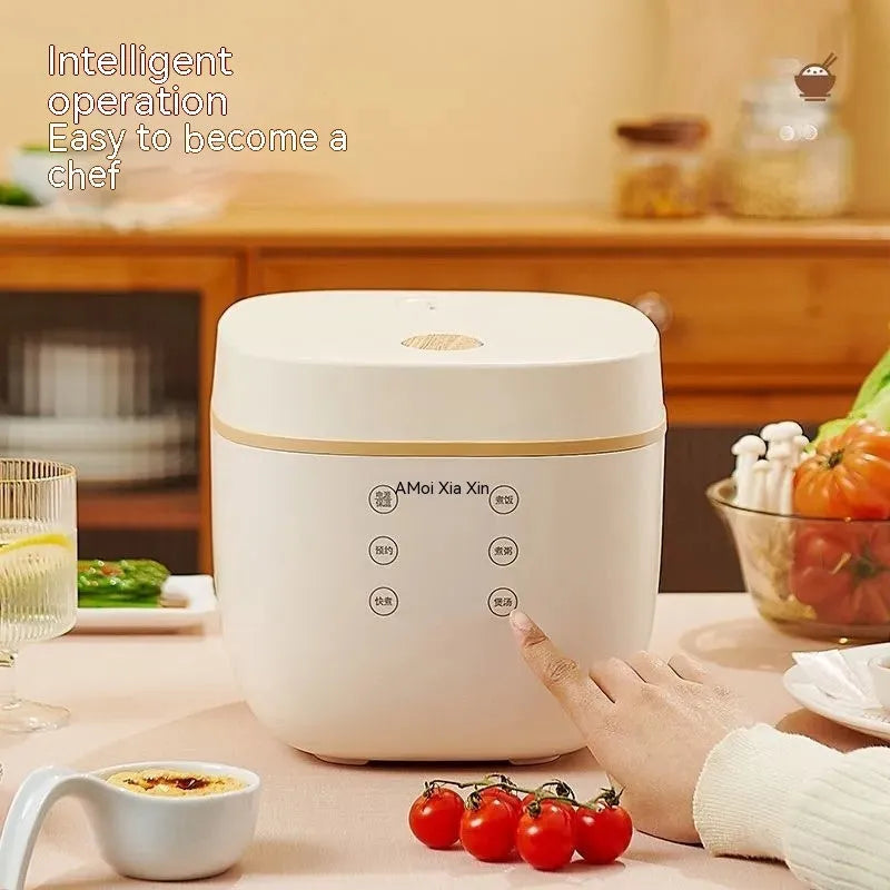 White or beige 3L multi-function rice cooker with accessories on kitchen counter