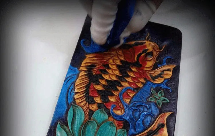 Men's hand-carved cow leather short wallet in blue, showing card slots and compact size.