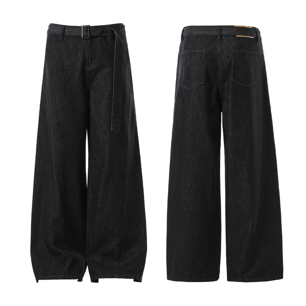 Black high-waist straight-leg jeans with gold contrast stitching on a flat lay.