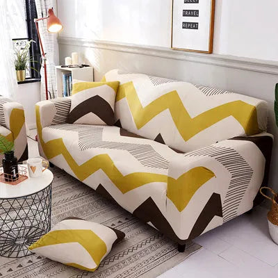 Printed geometric pattern stretch sofa slipcover fitted on a modern three-seater sofa.