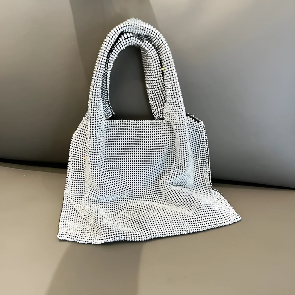 Silver evening handbag with shiny rhinestones and open pocket design made from cotton thread