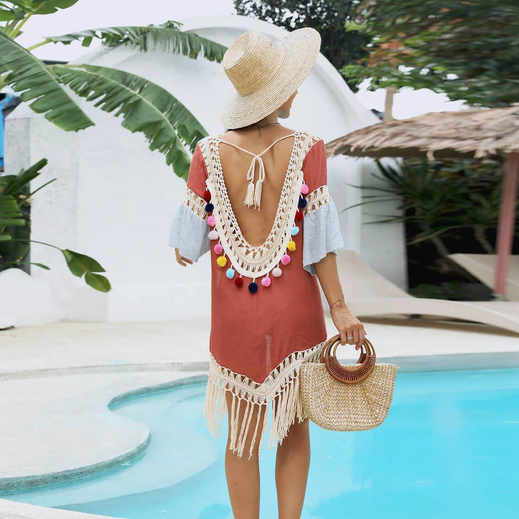 Orange hand crochet beach overskirt with floral pattern and tassel decoration