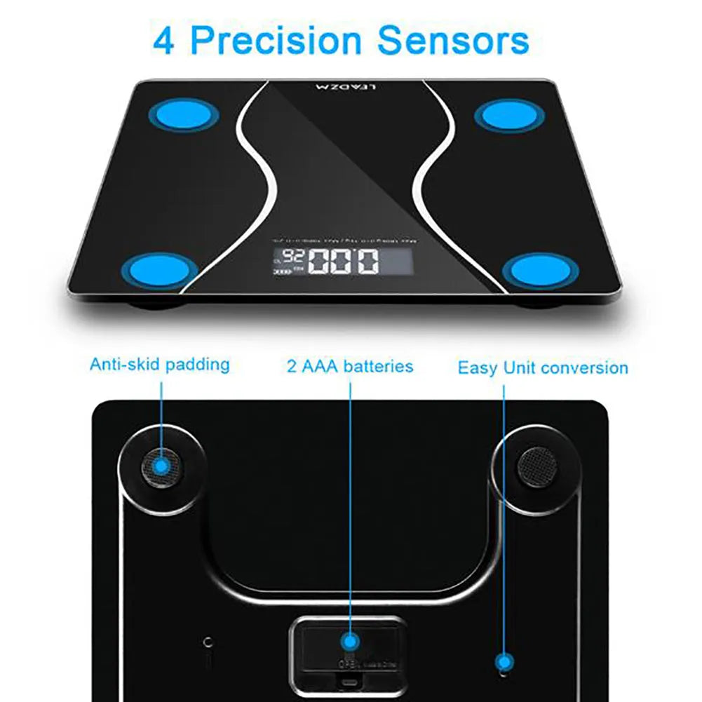 Black electronic digital bathroom scale with a 180kg capacity on a tiled floor.