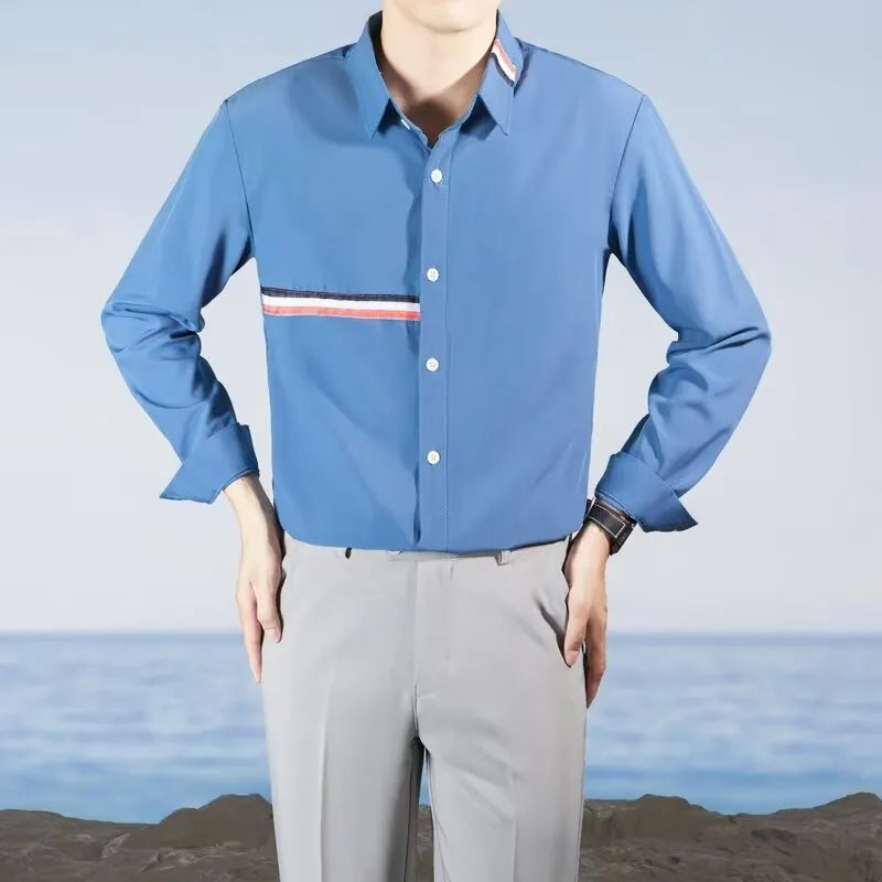 Hong Kong style loose fit cotton blend shirt in light blue, showing cardigan design on a hanger.